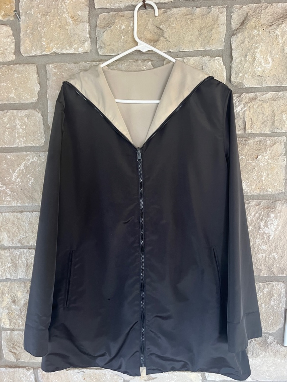 Reversible Tan and Black Hooded Zippered Rain Jacket with Storage Bag